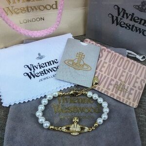 Vivienne Westwood Gold and White Pearl Bracelet